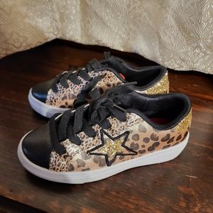 Skechers,black and gold  size 12.5